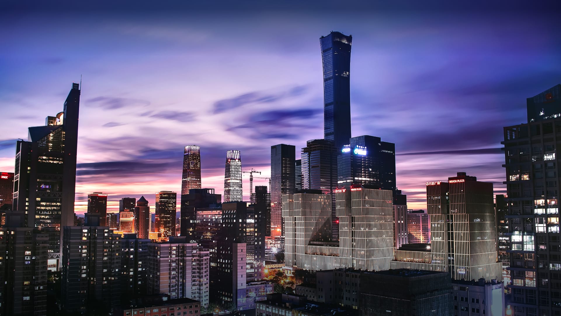 Chinese city skyline at dusk.