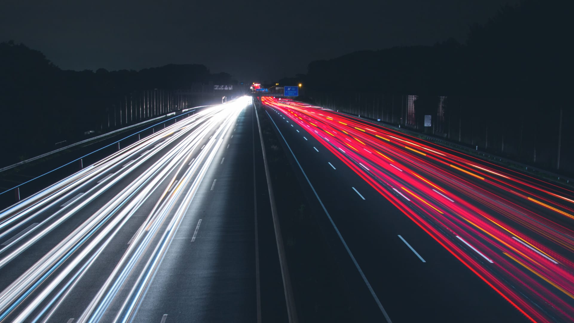 time lapse photography of busy highway during night time