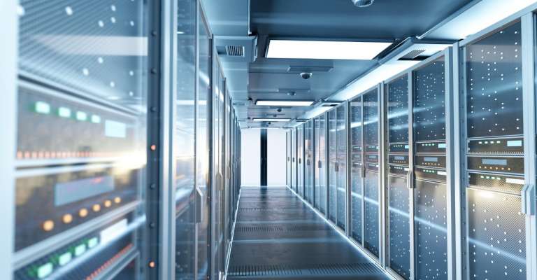 View of a hallway through an active data center.